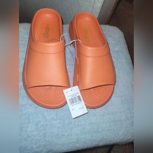 Orange slides. Size 8. NWT.